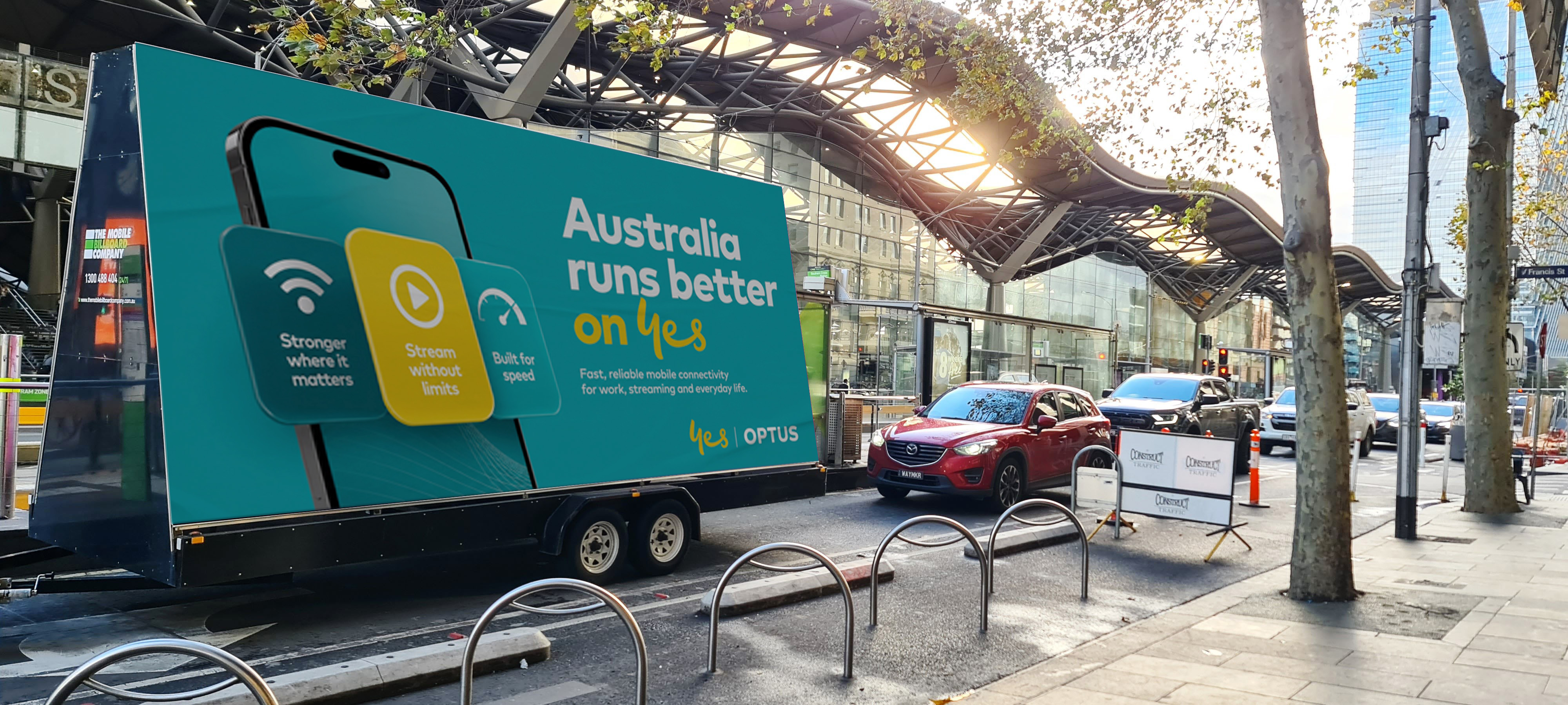 Optus A Optus mobile billboard on Melbourne CBD streets including Swanston Collins and Bourke Street